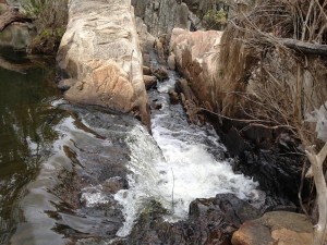 Heavy rain periods over the last couple of years have changed the course of the creek and now zig zags down these straight rock flows to the smaller falls.